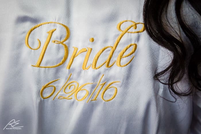 How cool is her embroidered robe with her wedding date?